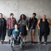 Group of people from diverse backgrounds with various disabilities